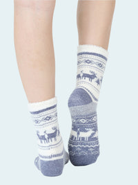 White socks with blue patterns featuring deer on a white background