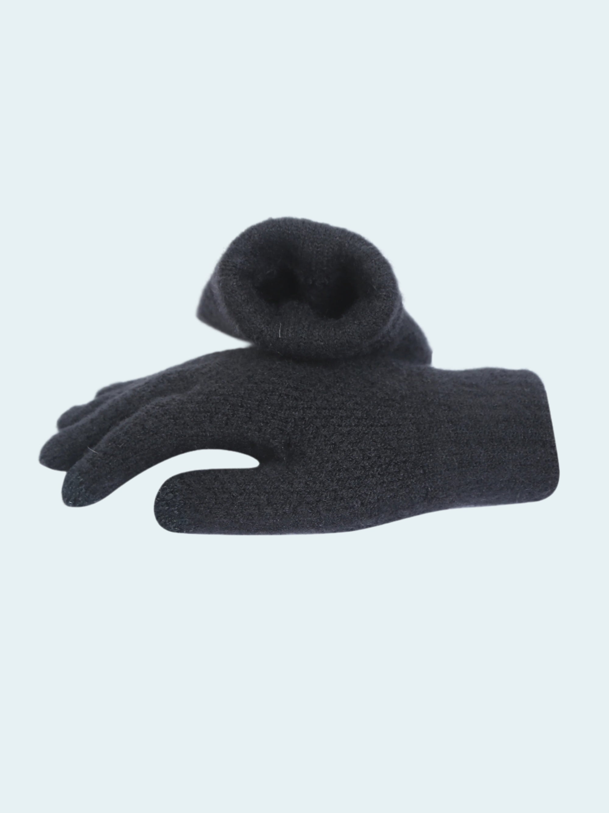 Dark gray glove on a white background