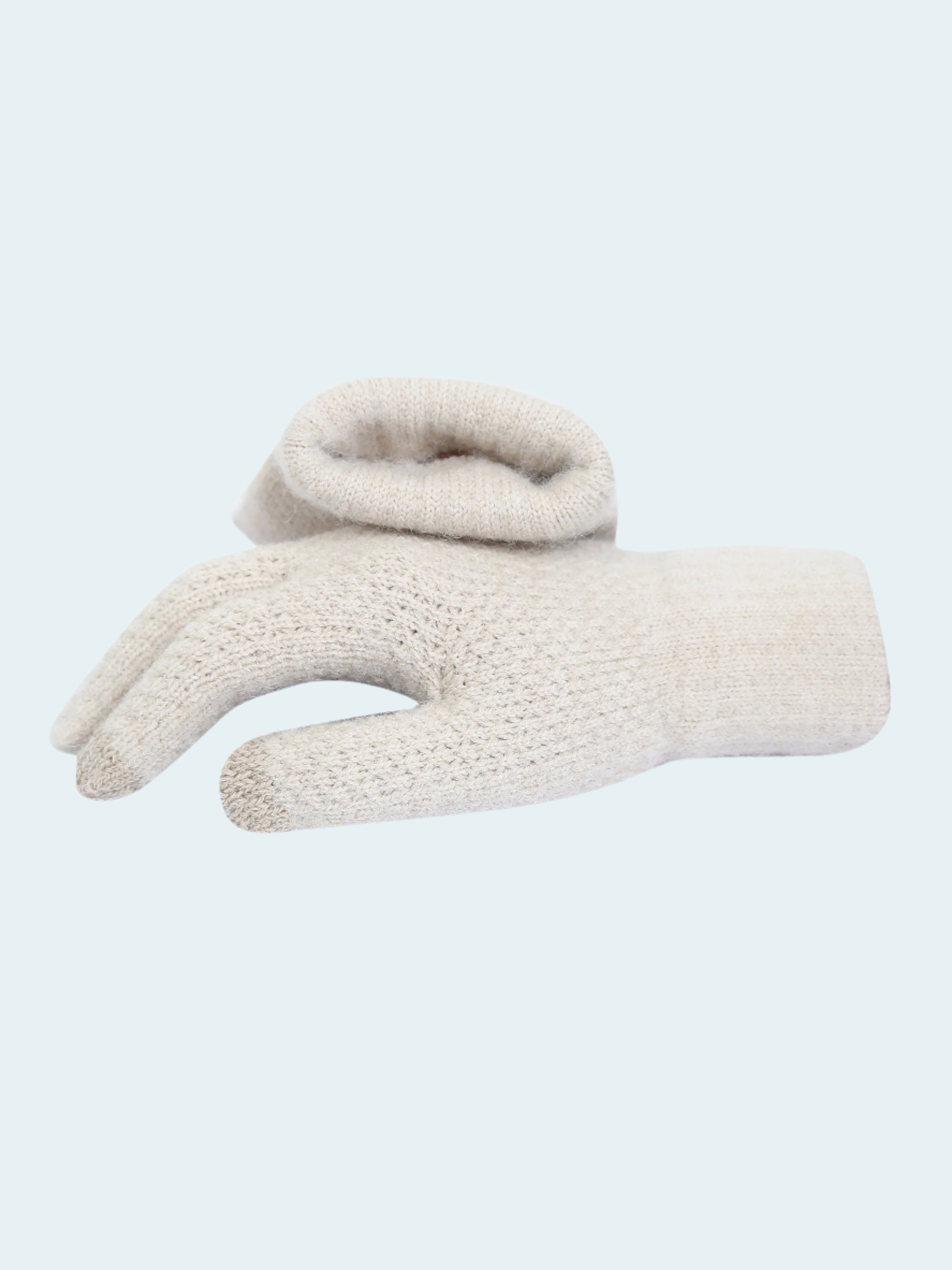 White fleece glove on a white background