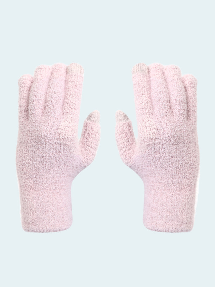 Pair of pink fuzzy gloves on a white background