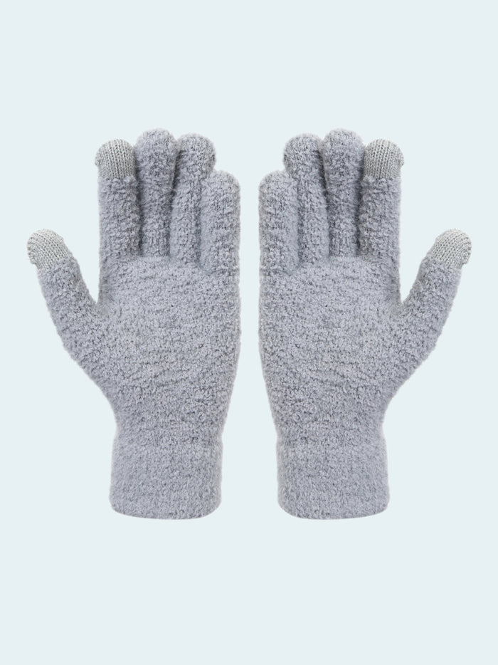 Pair of gray fuzzy gloves on a white background