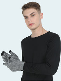 Person wearing a black long-sleeve shirt and gray gloves with black fingertips on a white background
