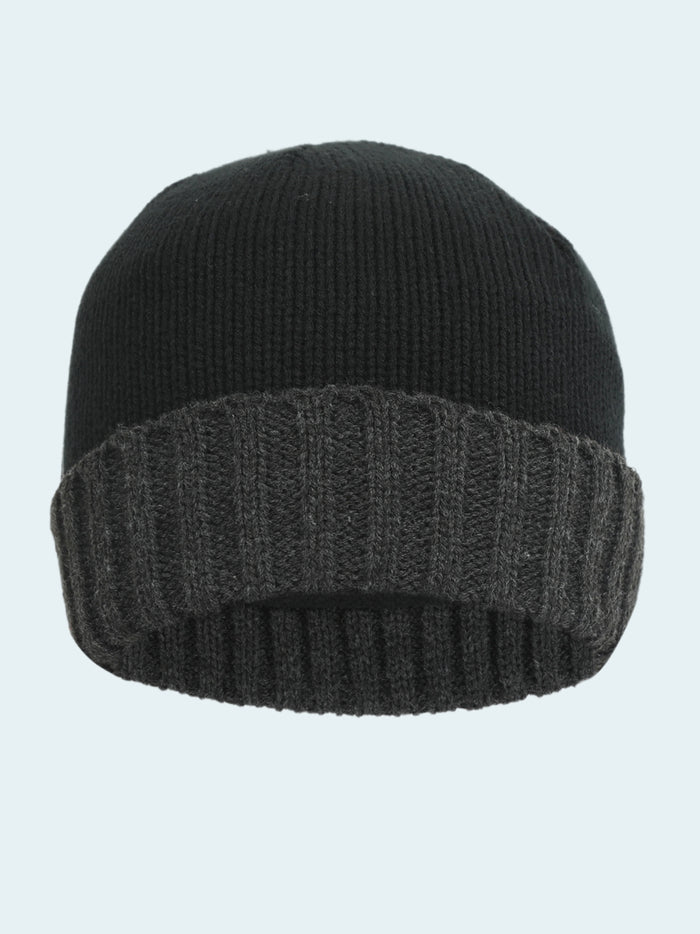 Black knit beanie with ribbed texture on a white background