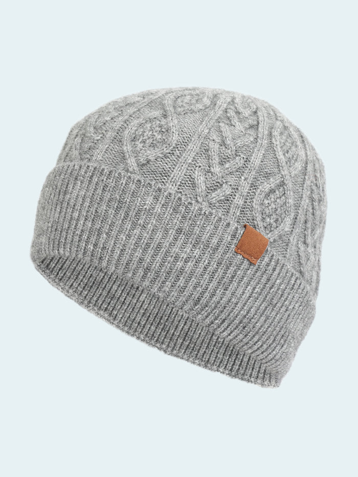 Gray knit beanie with a brown label on a white background