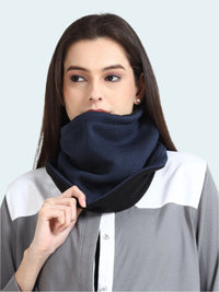Woman wearing a navy blue gaiter around her neck.