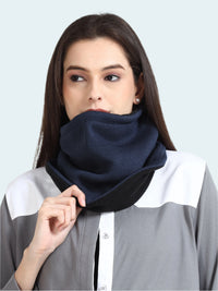 Woman wearing a navy blue gaiter around her neck.