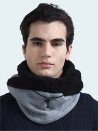 Man wearing a gray balaclava with a black sherpa lining on a white background