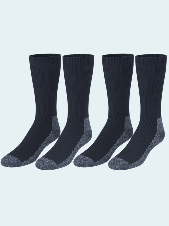 Four black socks with gray toes and heels on a light gray background