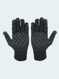 Pair of black gloves with a pattern on a light gray background