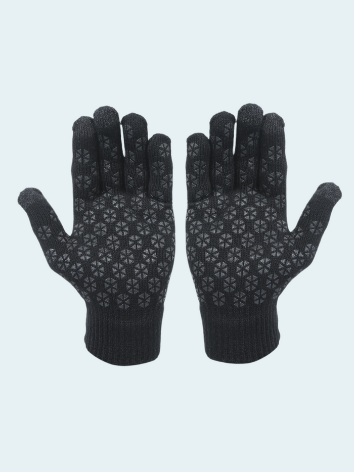 Pair of black gloves with a pattern on a light gray background