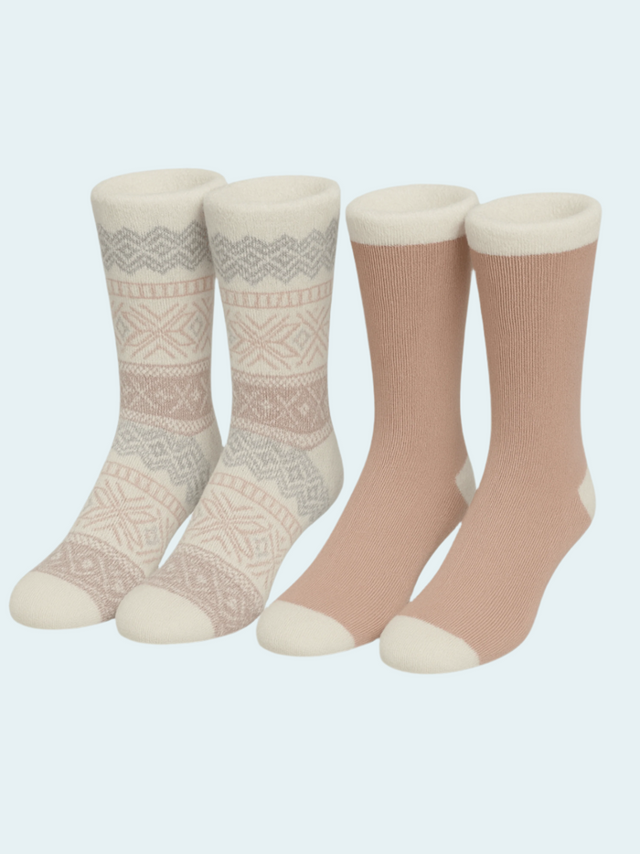 Two pairs of socks with patterned and solid designs on a light gray background