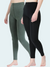 Person wearing green and black leggings on a white background