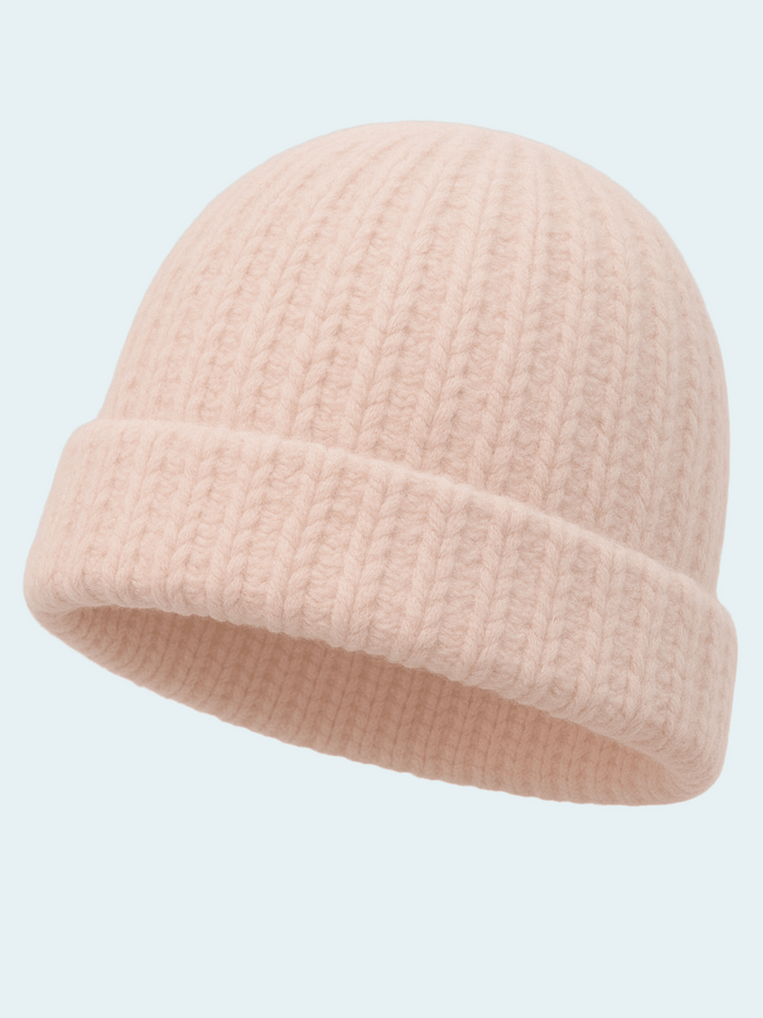 Blush Color beanie hat on a light blue background