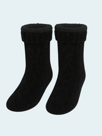 Pair of black chennille socks on a light blue background