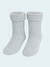Pair of gray chenille knit socks on a light blue background