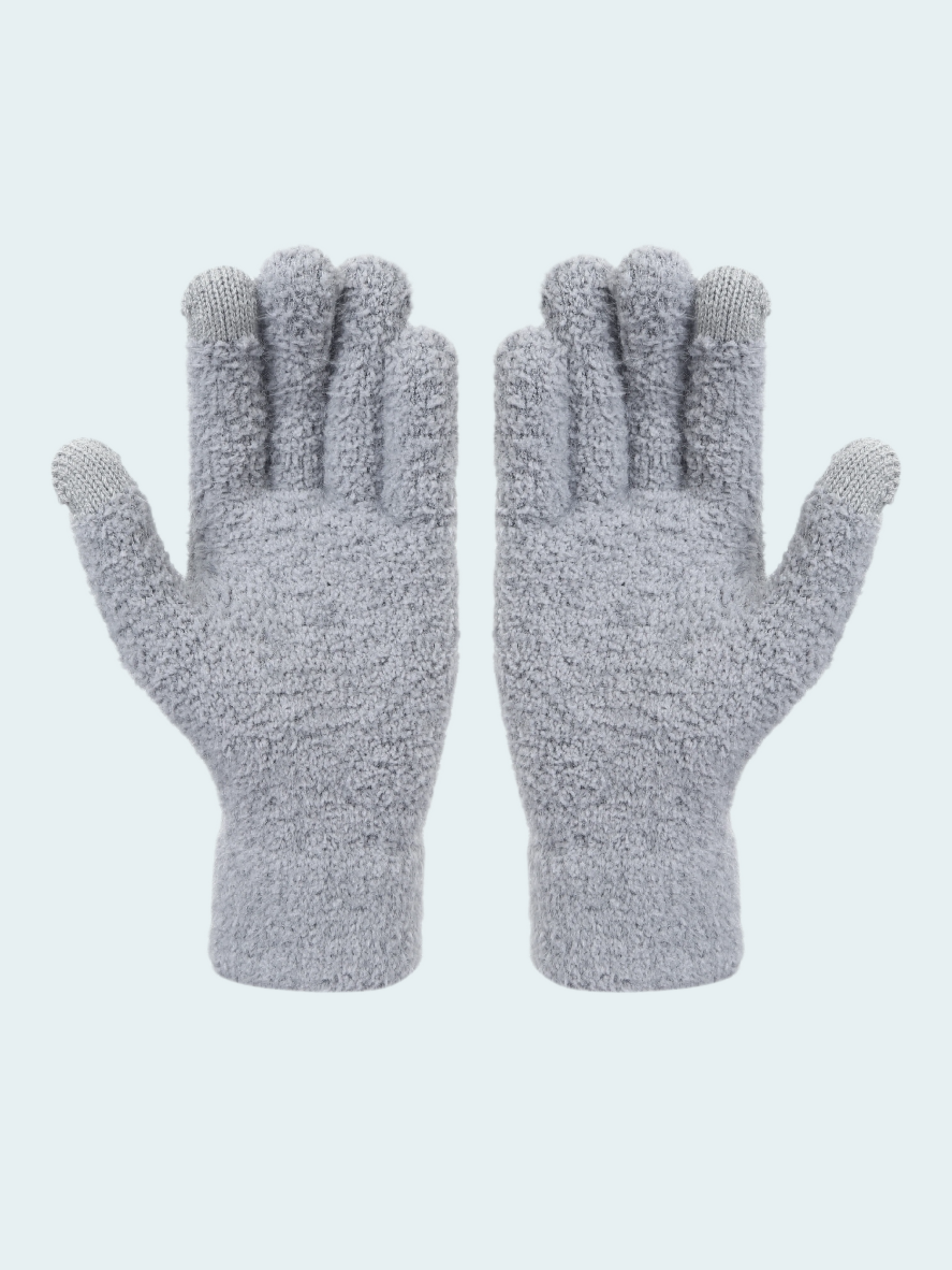 Pair of gray gloves on a light gray background