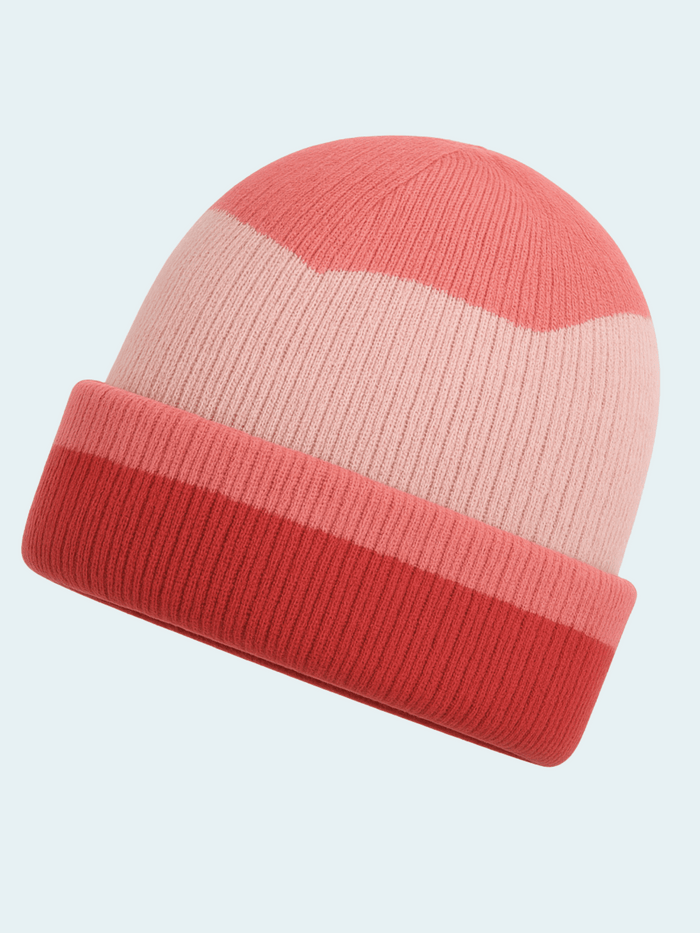 Two-tone pink and red beanie on a light gray background