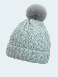 Knitted beanie with a gray pom-pom on a light blue background