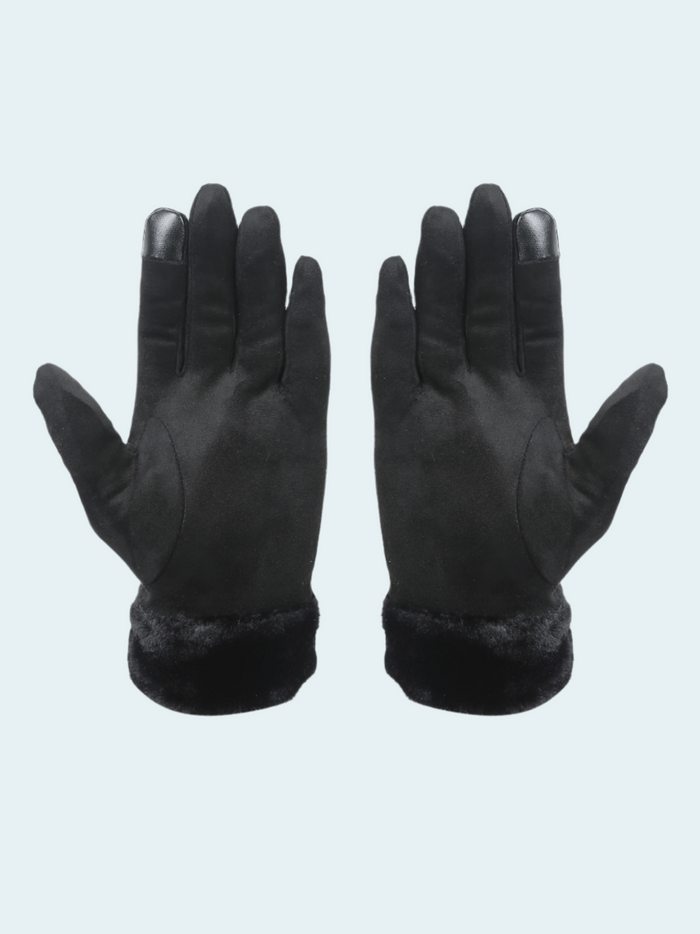 Pair of black gloves with fur cuff on a light gray background